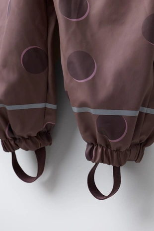 Прорезиненный комбинезон в горошек WATER RESISTANT- Заказать в России