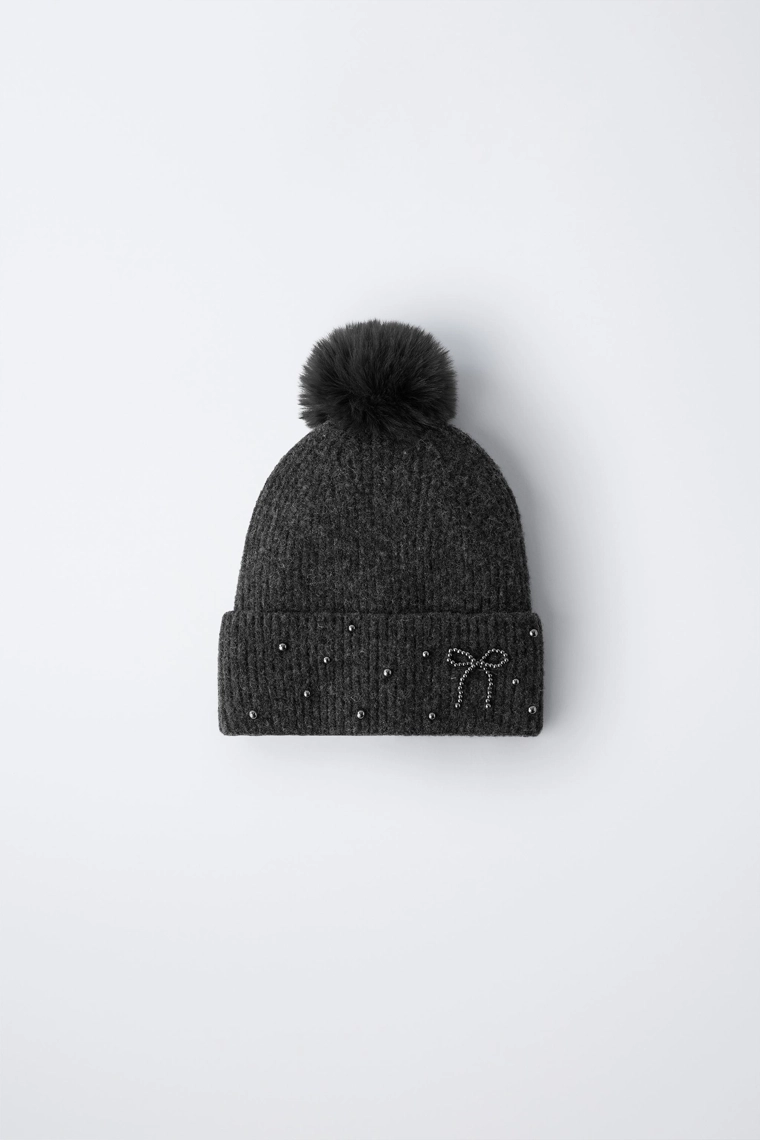 Вязаная шапка с шерстью и помпоном, украшенная блестками