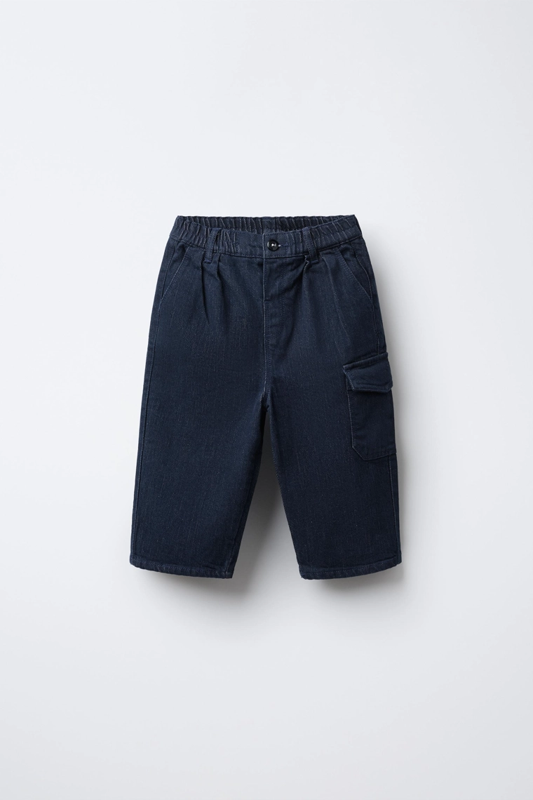 Джинсы с карманными клапанами