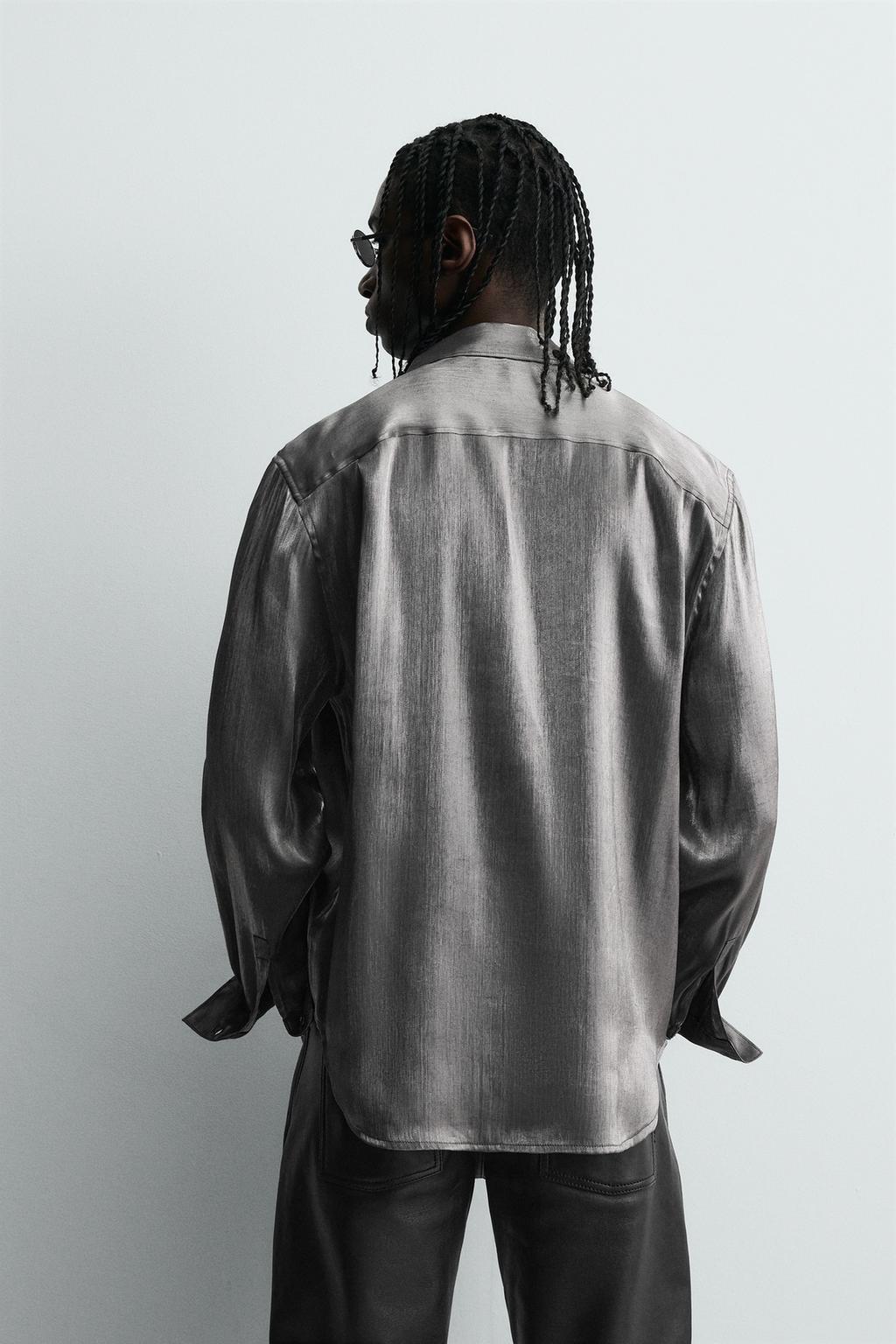 СВЕРКАЮЩАЯ РУБАШКА СТРУЯЩЕГОСЯ ПОКРОЯ