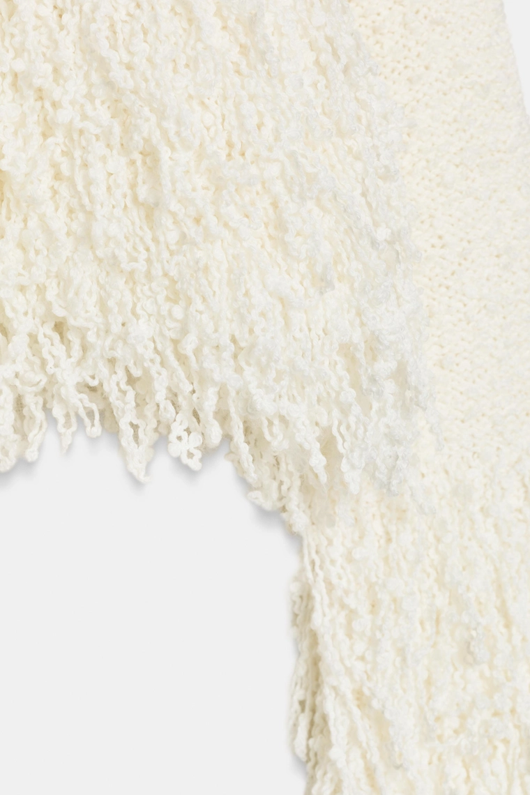 Вязанный свитер с бахромой