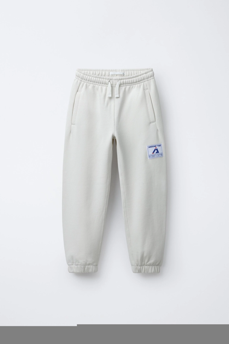 Джоггеры со значком zara