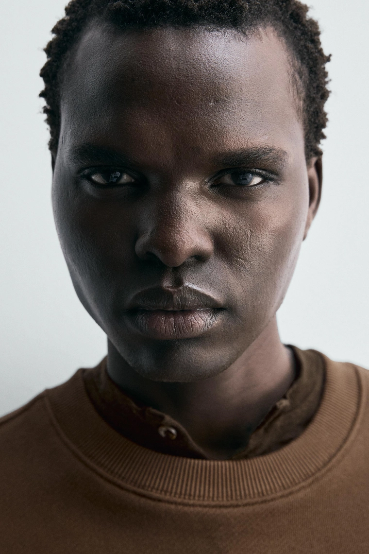 Свитшот с круглым вырезом и деталями из ленты