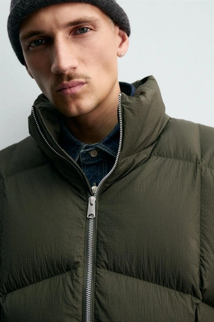 Пуховик из 100% пера- Заказать в России