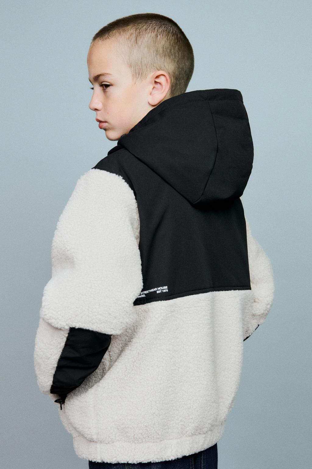 КУРТКА ИЗ ИСКУССТВЕННОЙ ОВЧИНЫ И НЕЙЛОНА