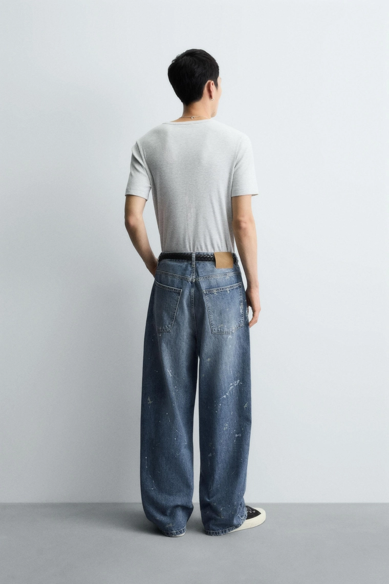 Джинсы свободного кроя с кляксами краски