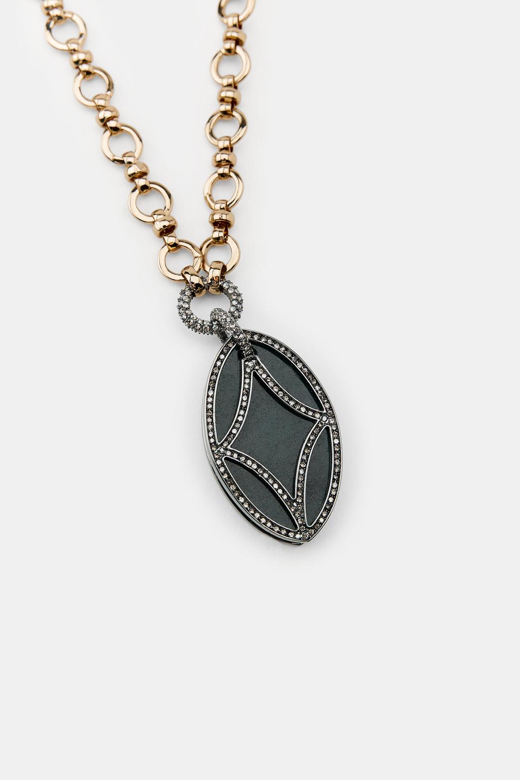 Ожерелье с кольцами и подвеской с блестками