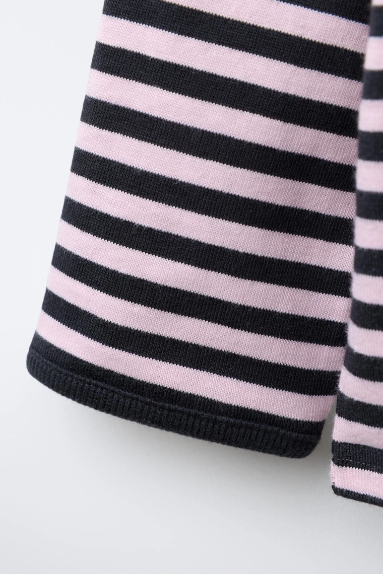 Футболка с тканевой полоской и вышитым сердцем