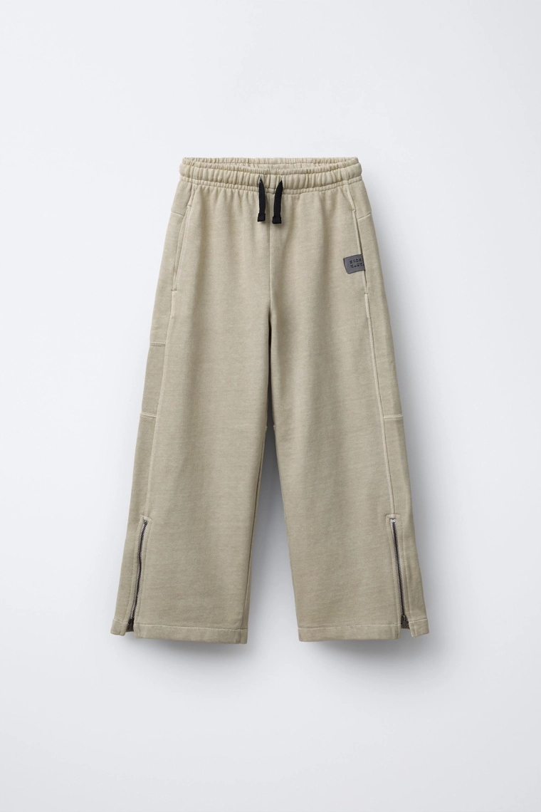 Широкие плюшевые брюки в меланжевой окраске