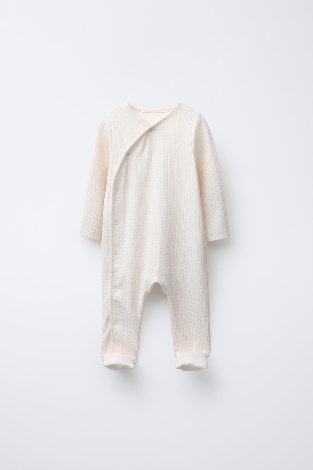 КОМБИНЕЗОН С РЕГУЛИРУЕМЫМИ ШТАНИНАМИ И V-ОБРАЗНЫМ ВЫРЕЗОМ