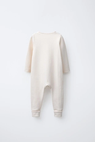 Комбинезон с регулируемыми штанинами и V-образным вырезом- Заказать в России