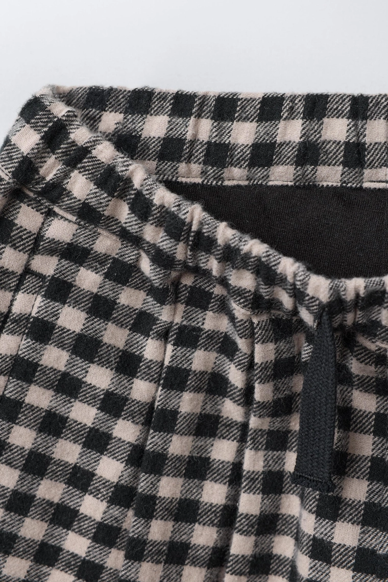 Брюки в клетку с объемным кроем