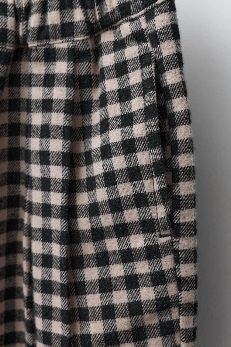 Брюки в клетку с объемным кроем