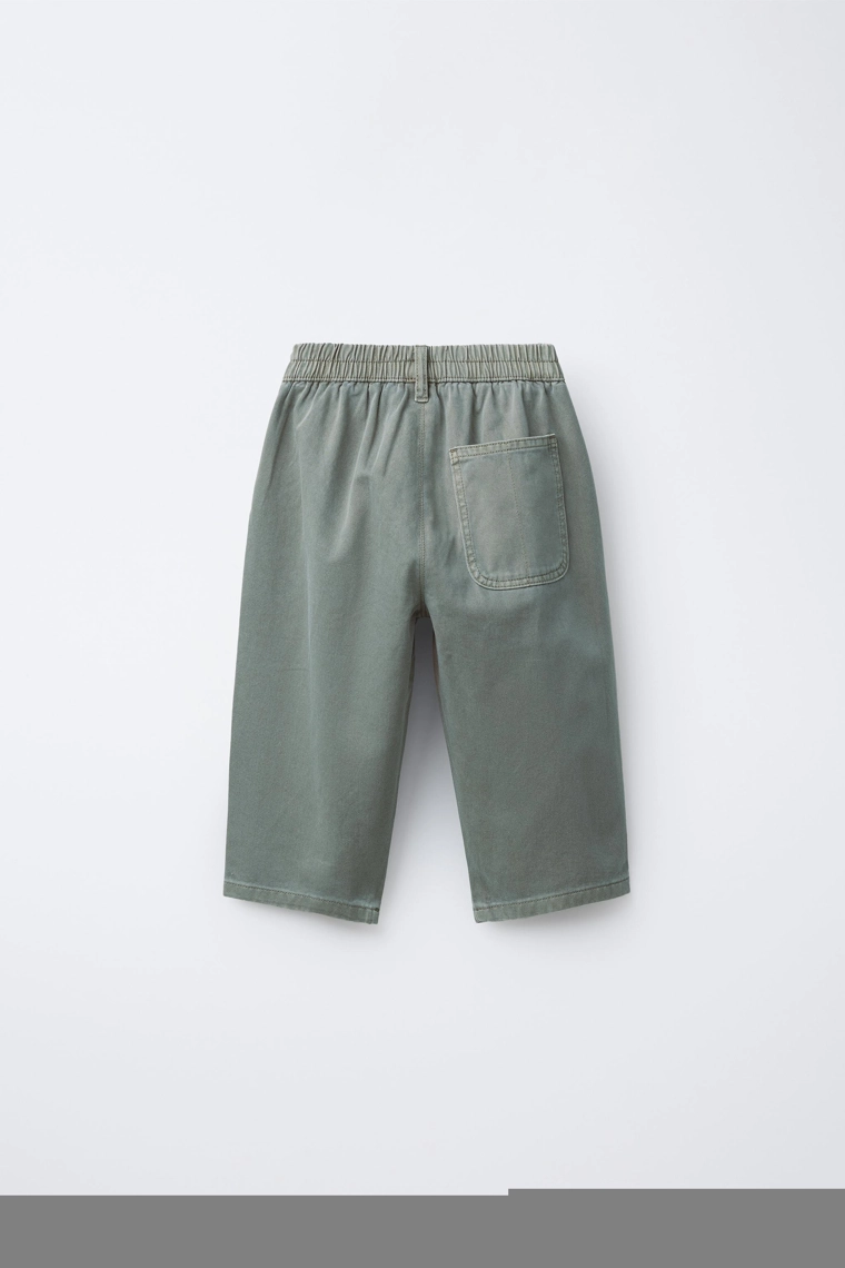 Брюки пышного покроя с проймами