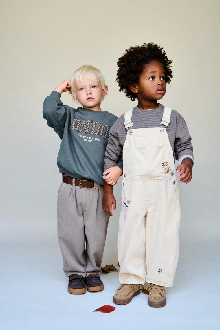 Брюки пышного покроя с отворотом