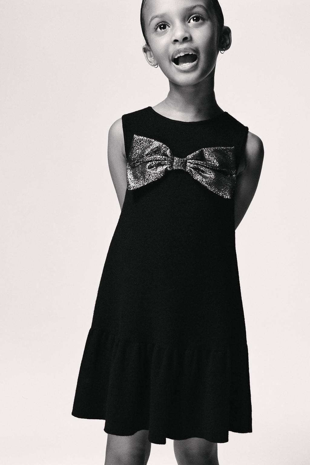 ТРИКОТАЖНОЕ ПЛАТЬЕ С БЛЕСТЯЩИМ БАНТОМ