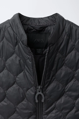 Стеганый жилет для верховой езды с комбинированными деталями- Заказать в России