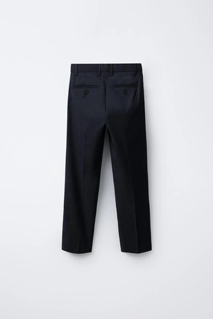 Костюмные брюки из рельефной ткани- Заказать в России