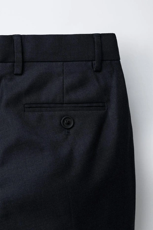 Костюмные брюки из рельефной ткани- Заказать в России