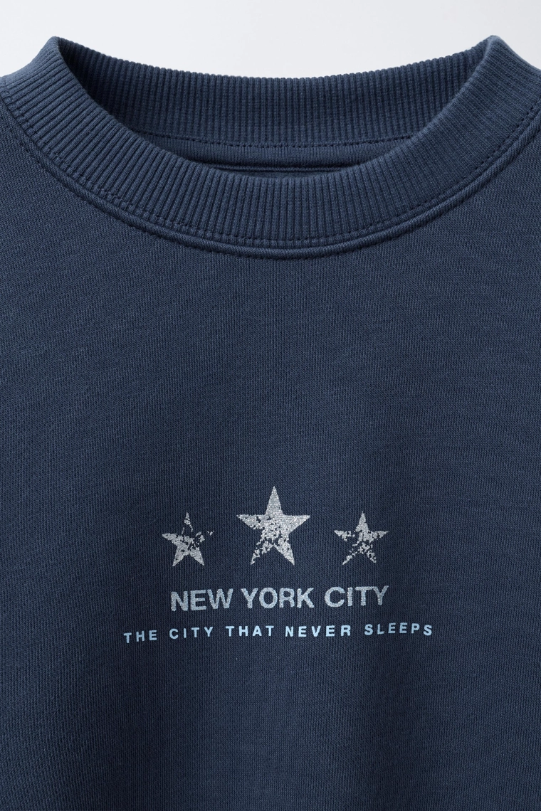 Толстовка с блестящим принтом звезд