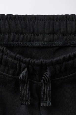 Брюки-джоггеры из ткани интерлок пике- Заказать в России