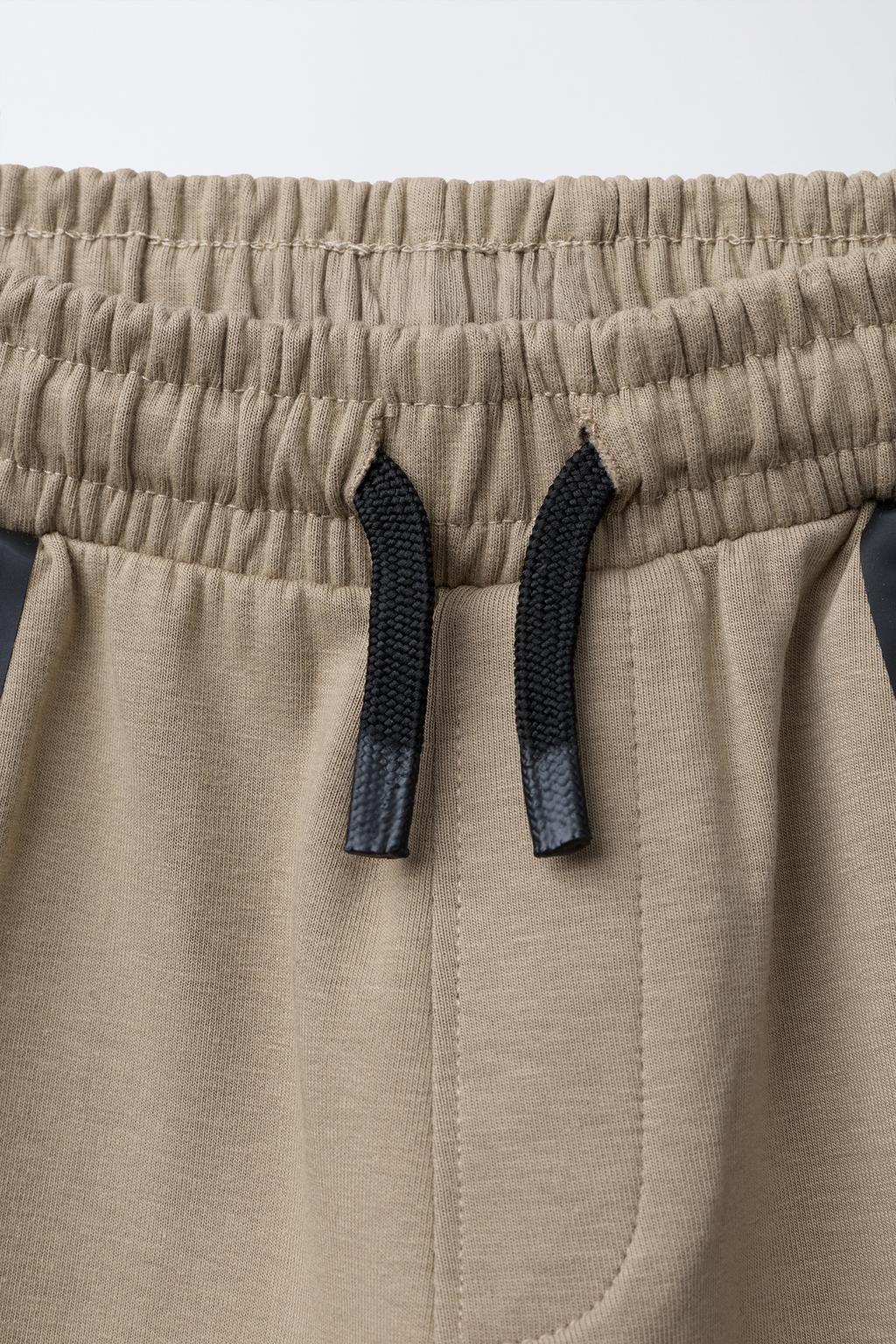 СПОРТИВНЫЕ БРЮКИ-ДЖОГГЕРЫ ИЗ INTERLOCK