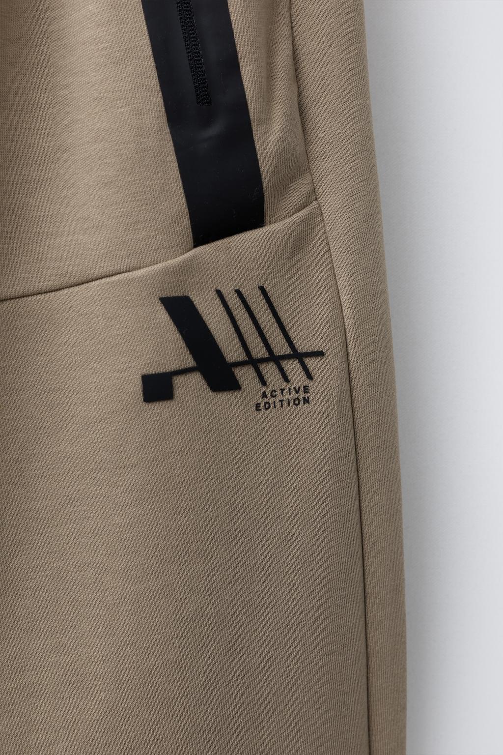 СПОРТИВНЫЕ БРЮКИ-ДЖОГГЕРЫ ИЗ INTERLOCK