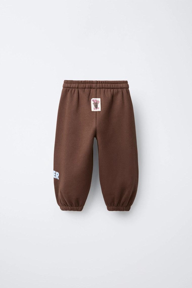 Брюки со стразным текстильным принтом