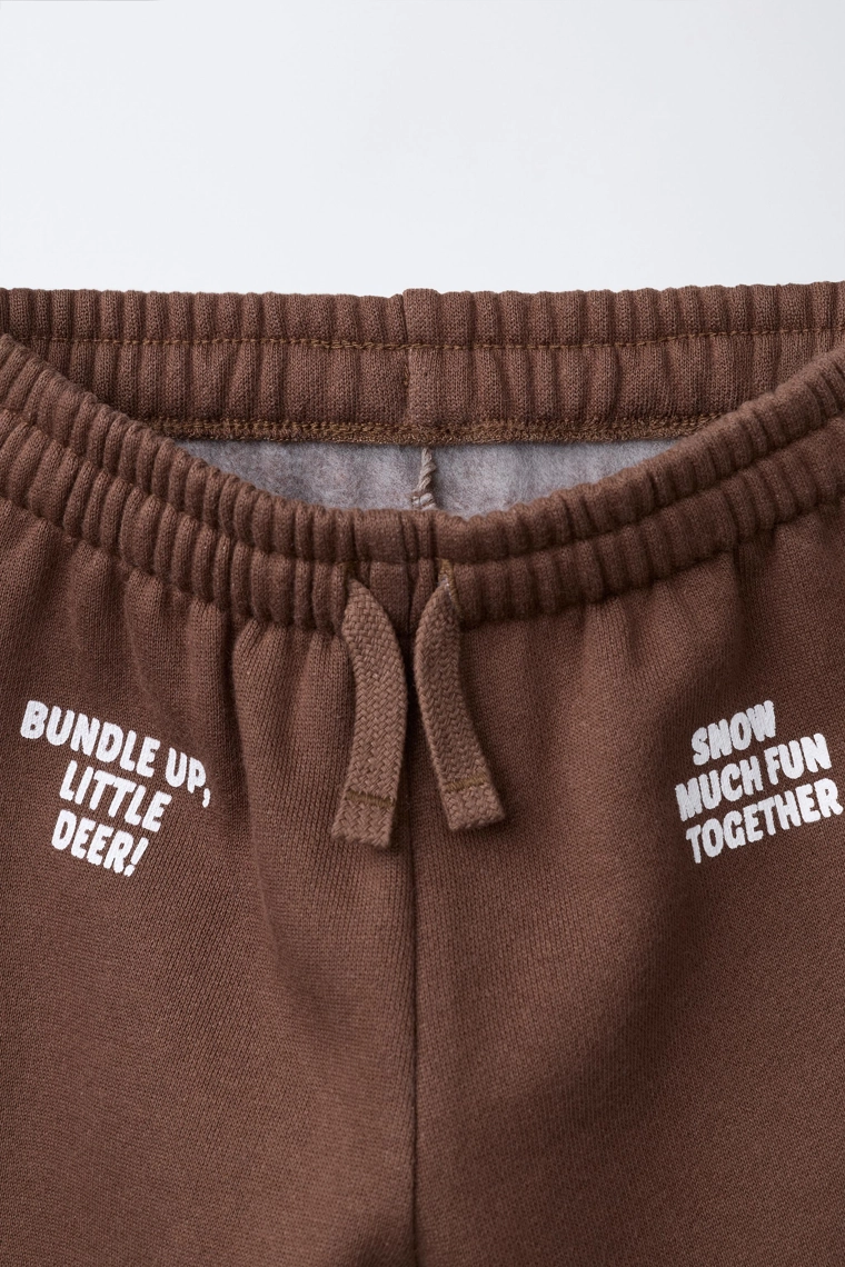 Брюки со стразным текстильным принтом