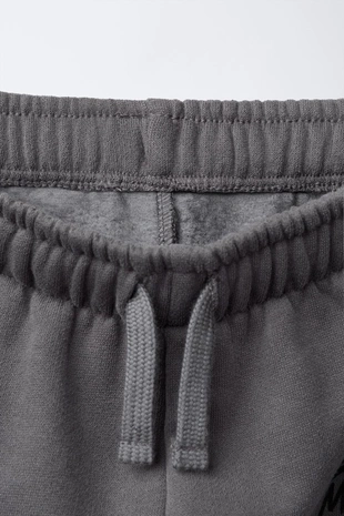 Брюки-джоггеры с принтом CARS LIGHTNING MCQUEEN © DISNEY- Заказать в России