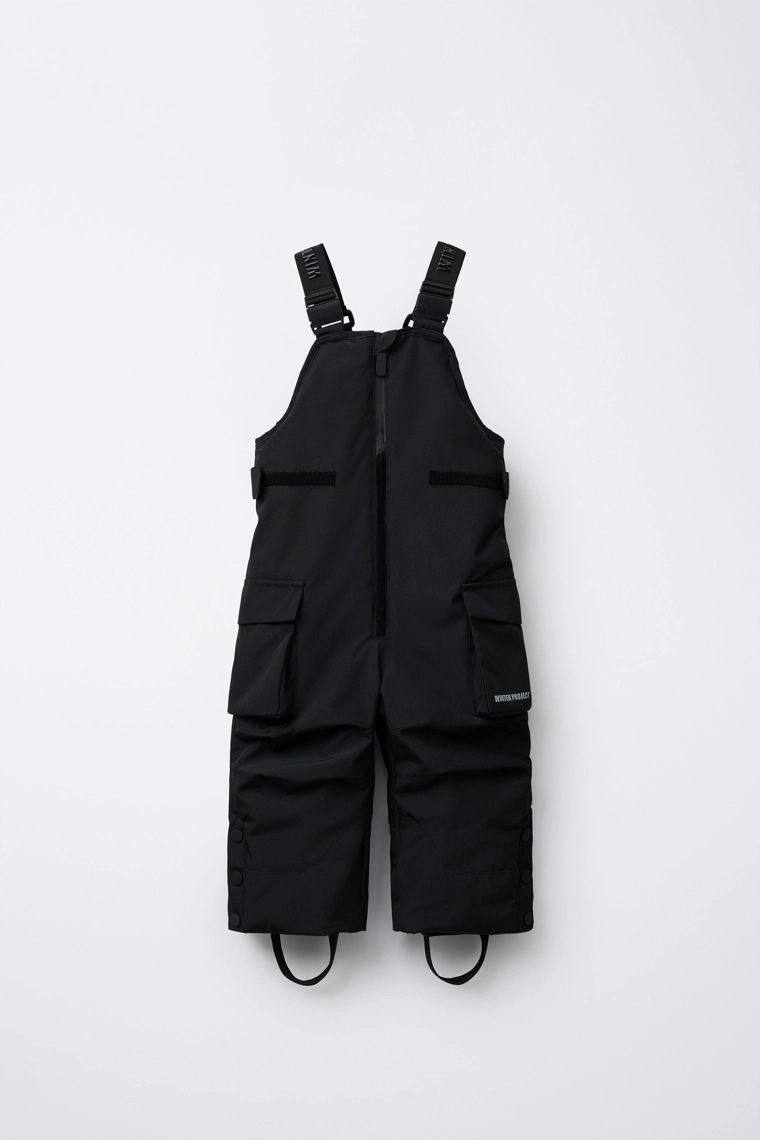 Длинные водонепроницаемые и ветрозащитные полукомбинезоны с карманами