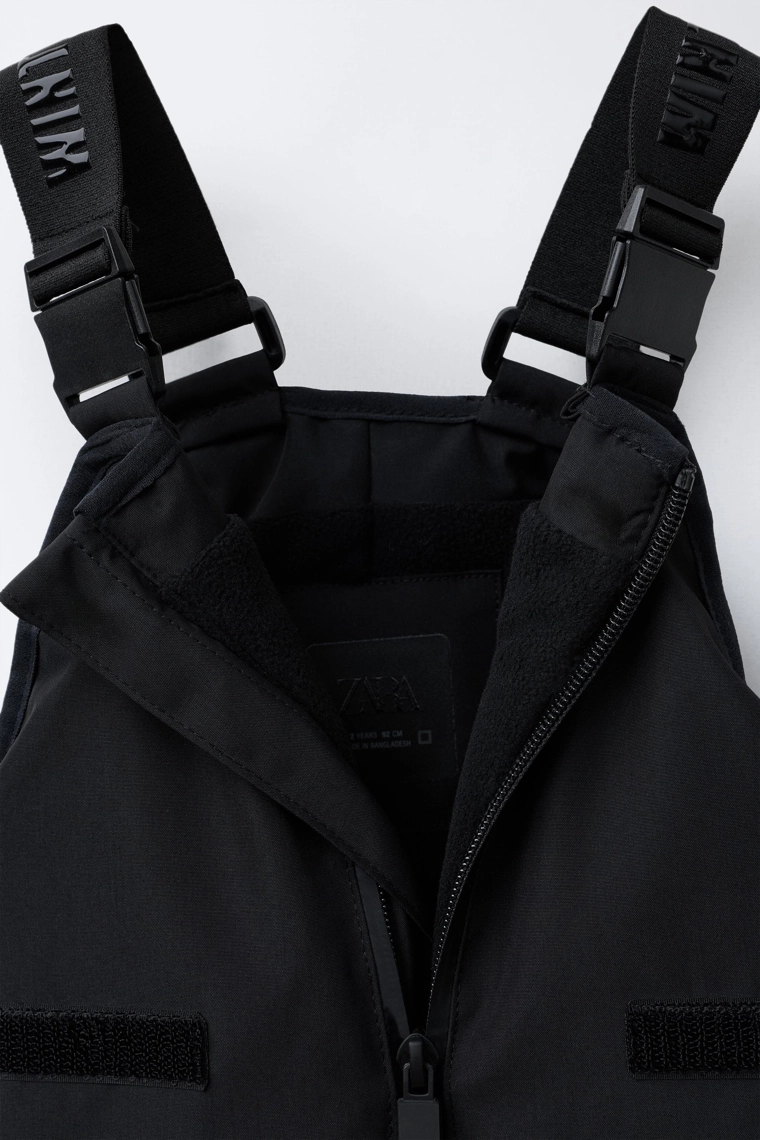 Длинные водонепроницаемые и ветрозащитные полукомбинезоны с карманами