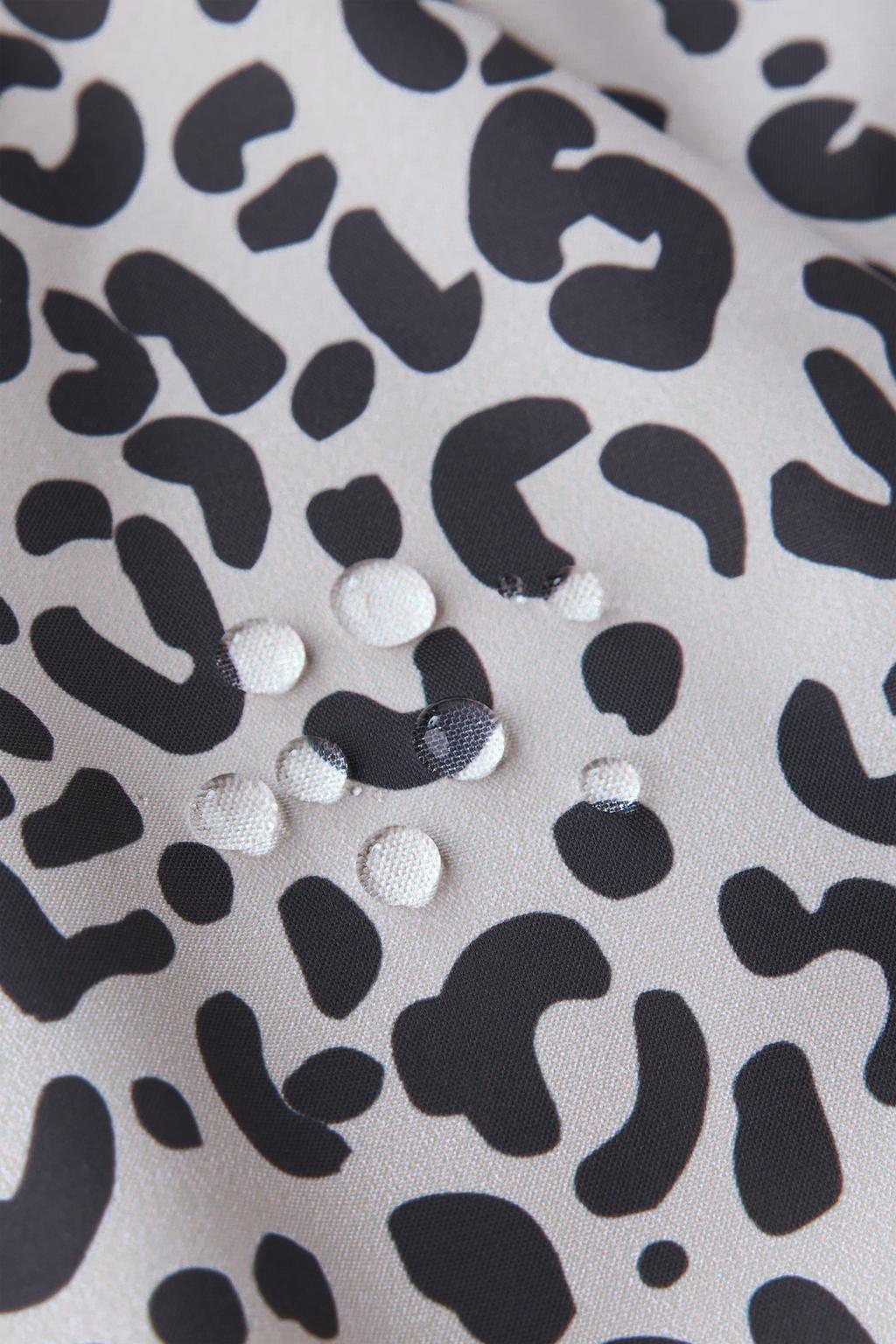 НЕПРОМОКАЕМЫЙ ВЕТРОЗАЩИТНЫЙ КОМБИНЕЗОН С АНИМАЛИСТИЧЕСКИМ ПРИНТОМ