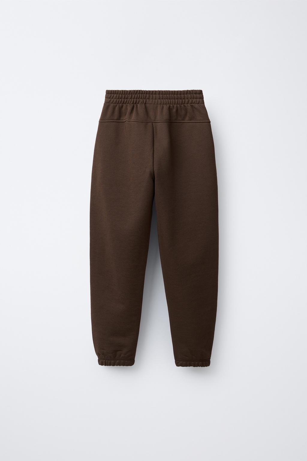 БРЮКИ-ДЖОГГЕРЫ С НАДПИСЬЮ