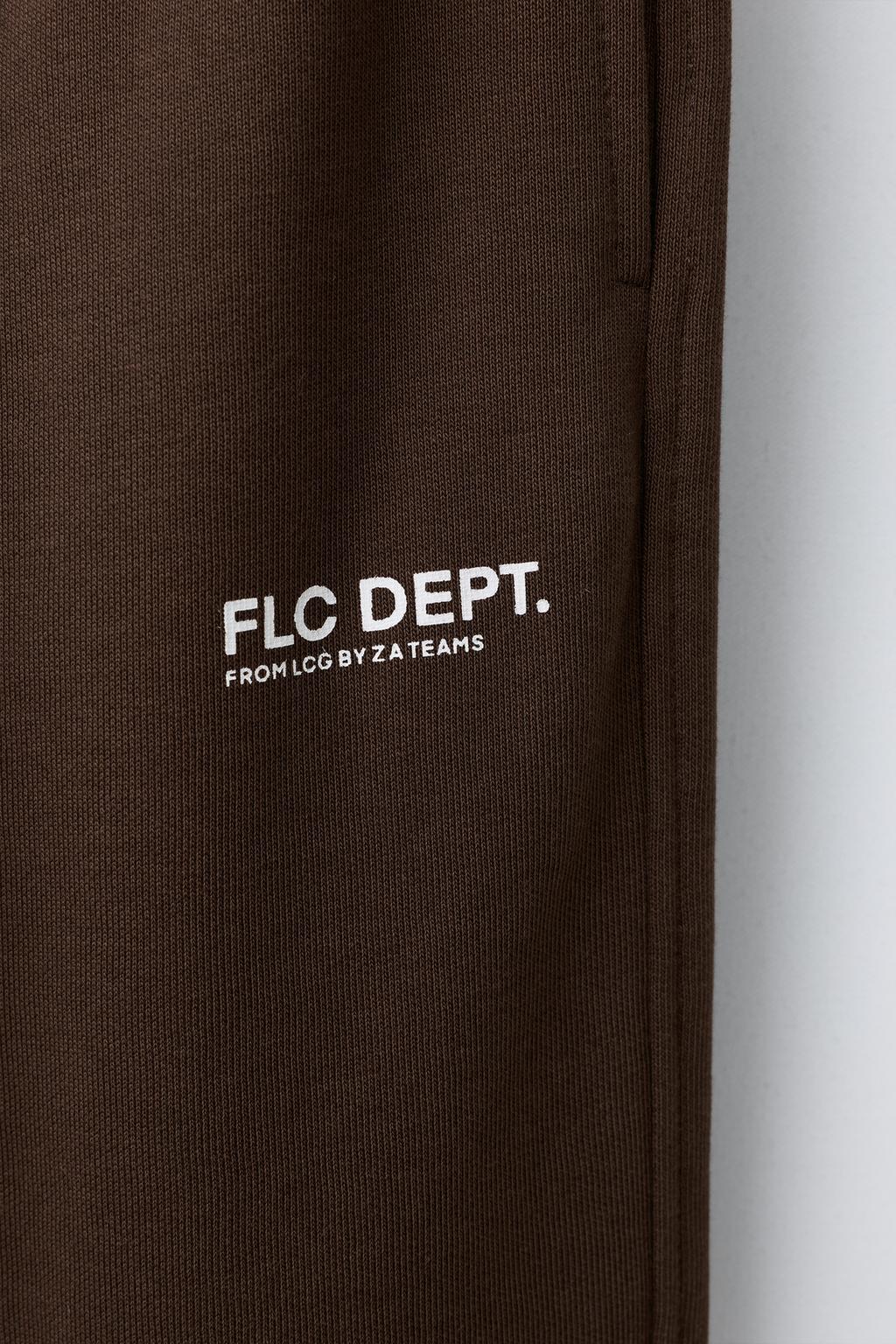 БРЮКИ-ДЖОГГЕРЫ С НАДПИСЬЮ