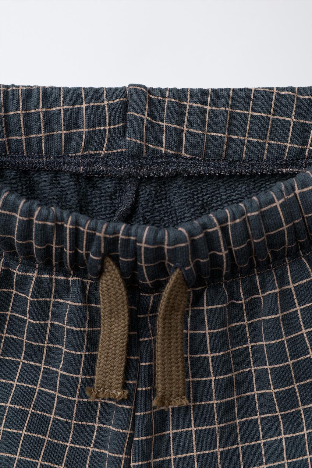 БРЮКИ СВОБОДНОГО КРОЯ В КЛЕТКУ