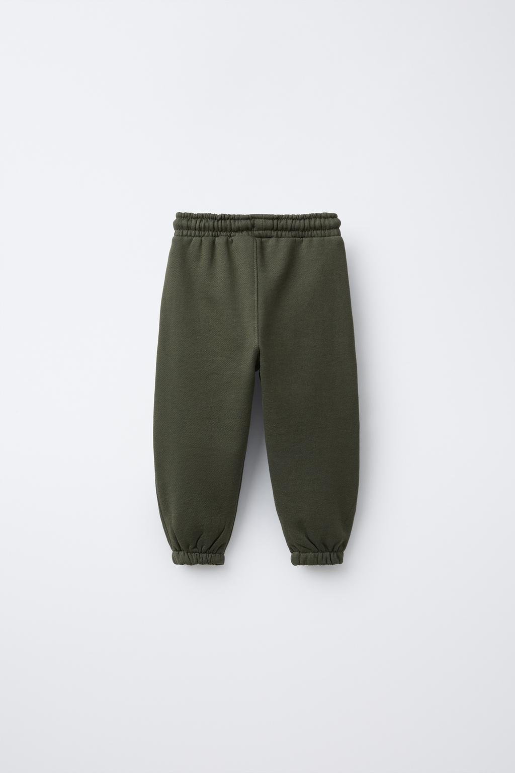 БРЮКИ-ДЖОГГЕРЫ С ЭТИКЕТКОЙ