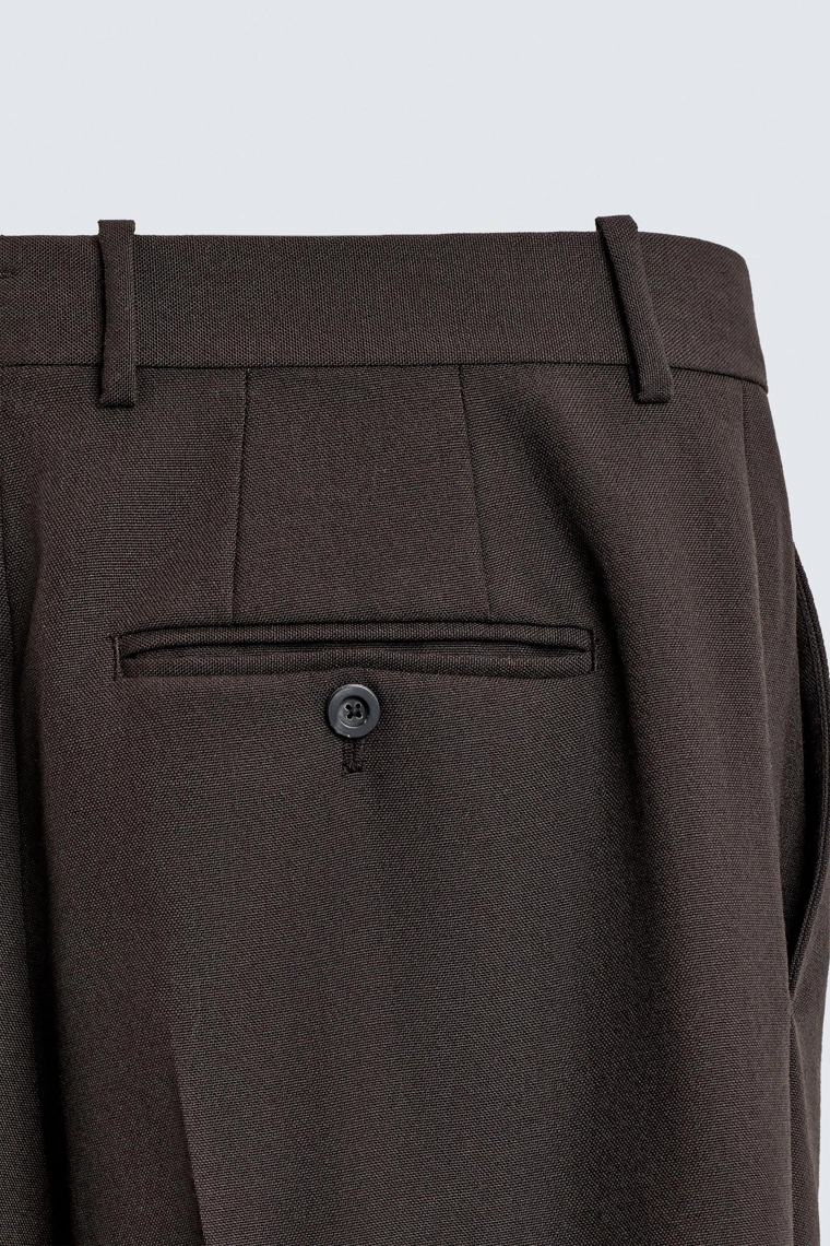 Брюки из 100% шерсти с защипами