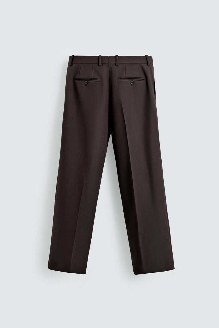 Брюки из 100% шерсти с защипами