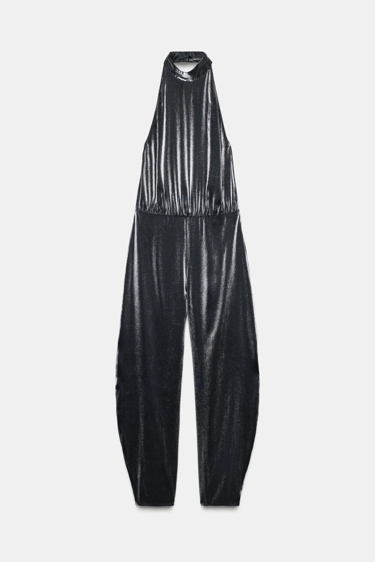 Комбинезон с глубоким вырезом и объемным подолом