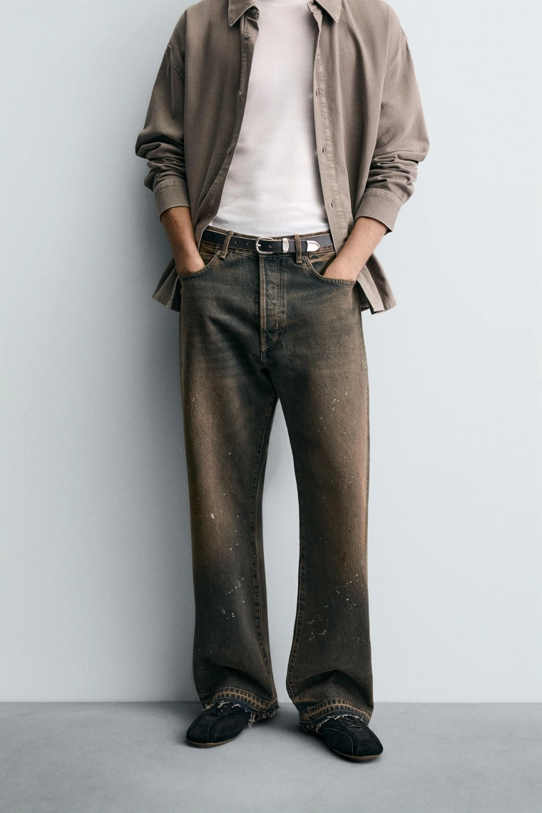 Джинсы свободного кроя с брызгами краски