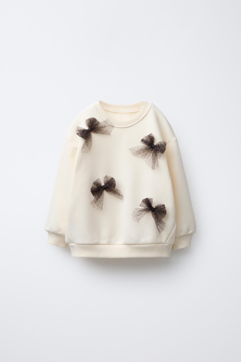 ТОЛСТОВКА С ТЮЛЕВЫМИ БАНТИКАМИ