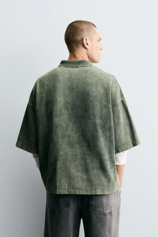 Поло из структурной ткани с эффектом потертости- Заказать в России