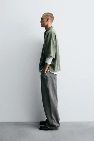 Поло из структурной ткани с эффектом потертости- Заказать в России