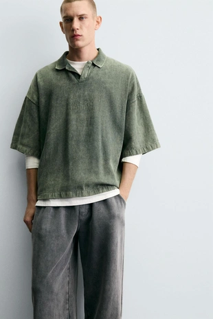 Поло из структурной ткани с эффектом потертости- Заказать в России