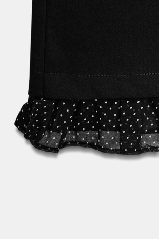 Мини-брюки с расклешенными штанинами и оборкой- Заказать в России