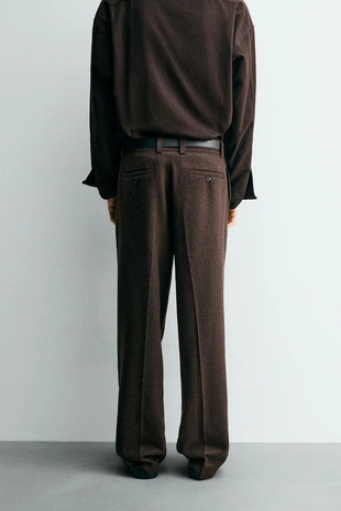 Брюки с защипами и пуговицами- Заказать в России