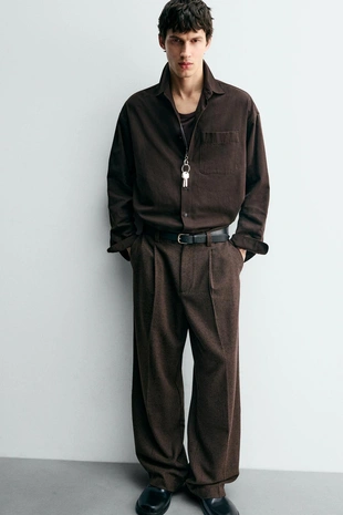 Брюки с защипами и пуговицами- Заказать в России