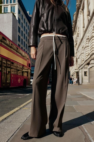 Брюки с широкими штанинами и двойным поясом- Заказать в России