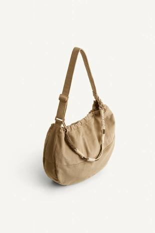 Сумка через плечо с отделкой, напоминающей хлеб, и съемным канатным элементом- Заказать в России